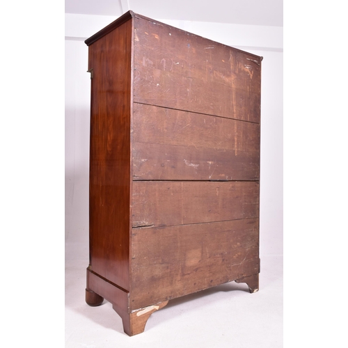 383 - A French Empire 19th century flame mahogany drop down secretaire á abbatant. The secretaire having a... 