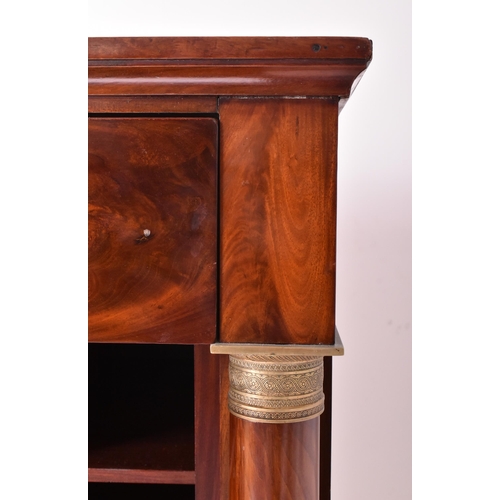 383 - A French Empire 19th century flame mahogany drop down secretaire á abbatant. The secretaire having a... 