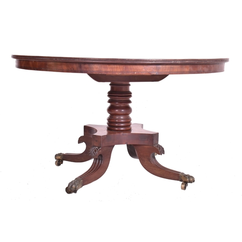 385 - A George III early 19th century mahogany tilt top breakfast table. The table having a circular top w... 