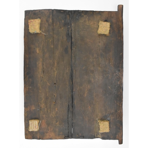 397 - A 20th century tribal African carved Dogon Granary  wood architectural door. The door carved in reli... 