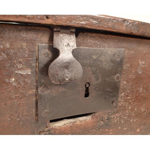 401 - A Charles II 17th century elm coffer. The chest having a lift up top with gadrooned edges and reeded... 