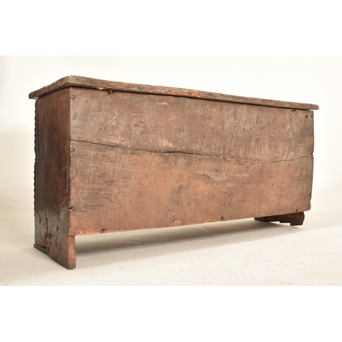 401 - A Charles II 17th century elm coffer. The chest having a lift up top with gadrooned edges and reeded... 