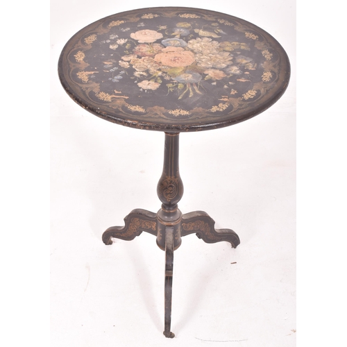 405 - A Napoleon III 19th century ebonised circular tilt top side table. The table having decorative flora... 