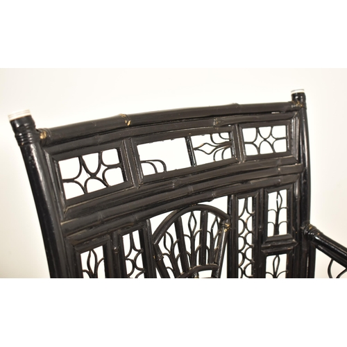 409 - An Aesthetic Movement 19th century ebonised bamboo Brighton Pavilion inspired chair. The chair havin... 