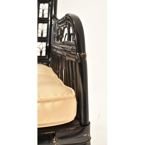 409 - An Aesthetic Movement 19th century ebonised bamboo Brighton Pavilion inspired chair. The chair havin... 