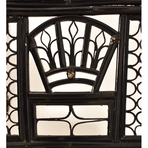 409 - An Aesthetic Movement 19th century ebonised bamboo Brighton Pavilion inspired chair. The chair havin... 