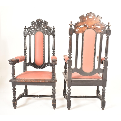 412 - A pair of Carolean Revival 19th century ebonised wood & leather throne chairs. Each having a carved ... 