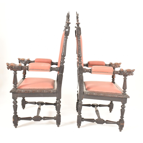 412 - A pair of Carolean Revival 19th century ebonised wood & leather throne chairs. Each having a carved ... 