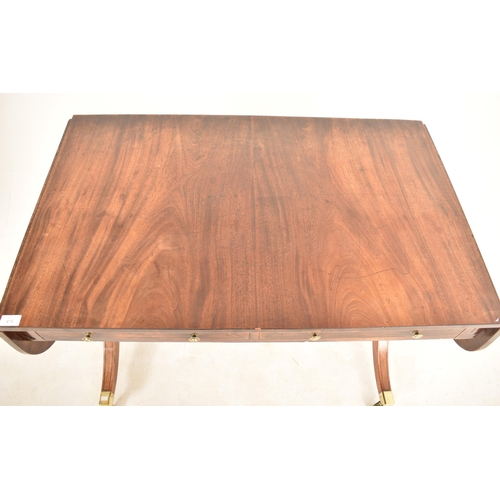 419 - A George III 18th century flame mahogany drop leaf sofa table desk. The table having a rectangular t... 