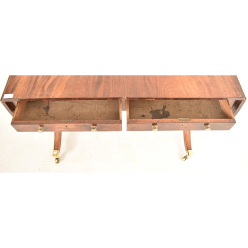 419 - A George III 18th century flame mahogany drop leaf sofa table desk. The table having a rectangular t... 