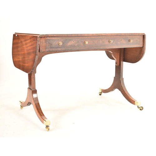 419 - A George III 18th century flame mahogany drop leaf sofa table desk. The table having a rectangular t... 