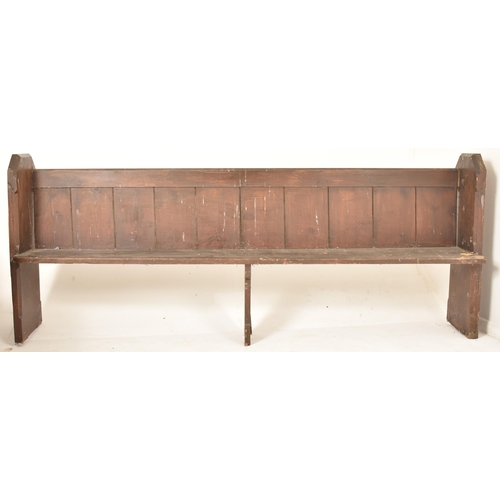 421 - A Victorian 19th century oak ecclesiastic church pew settle bench. The bench having a panelled back ... 