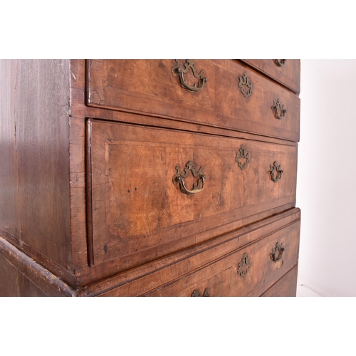 425 - An 18th century Queen Anne walnut tall boy chest on chest. The chest of drawers having a configurati... 