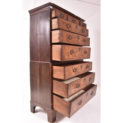 425 - An 18th century Queen Anne walnut tall boy chest on chest. The chest of drawers having a configurati... 