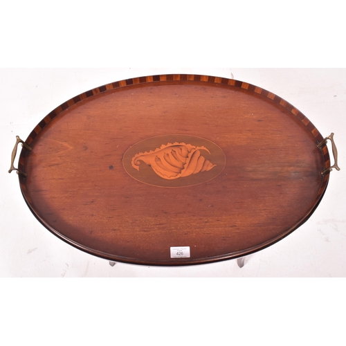 426 - A late Victorian Sheraton Revival mahogany & marquetry inlaid oval butler's tray on stand. The tray ... 