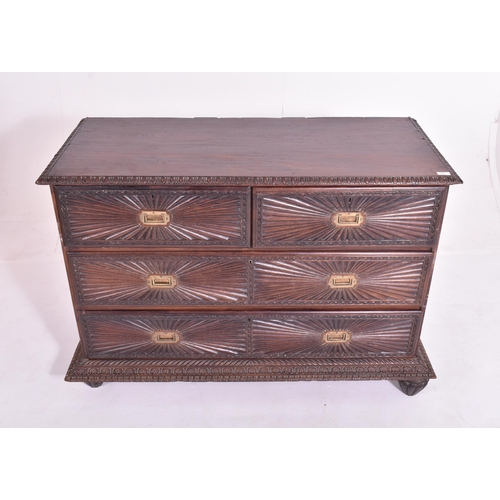 431 - A large Anglo-Colonial 19th century carved hardwood chest of drawers / credenza. The chest having a ... 