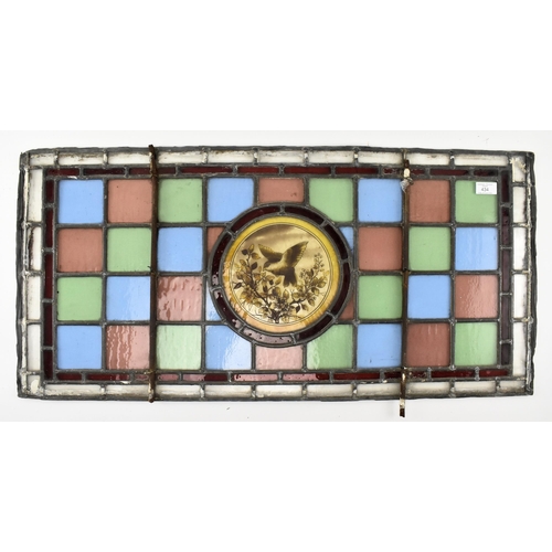 434 - A Victorian 19th century leaded stained glass decorative window panel. The rectangular panel having ... 