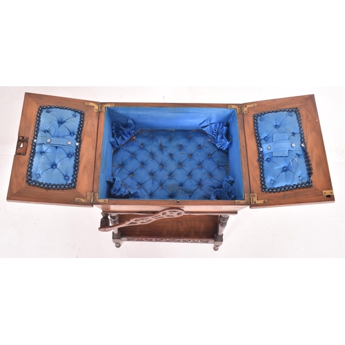 456 - A Victorian 19th century walnut inlaid sewing box on legs. The box having a fold out box atop with b... 