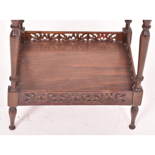 456 - A Victorian 19th century walnut inlaid sewing box on legs. The box having a fold out box atop with b... 