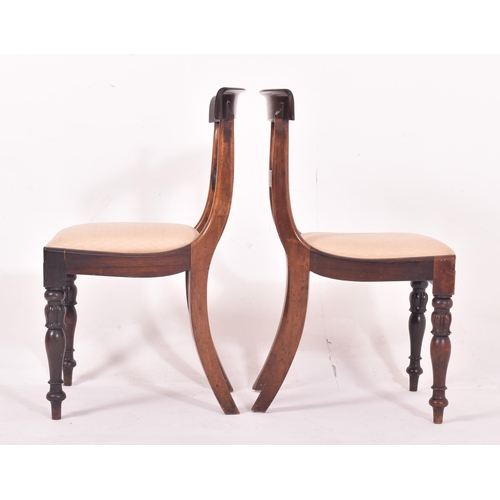 457 - An early 19th century George III mahogany extending dining table and eight rosewood Regency dining c... 