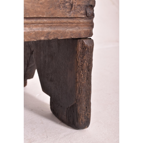 470 - A 17th century six plank oak coffer. The coffer having a hinged lid opening to reveal a spacious int... 