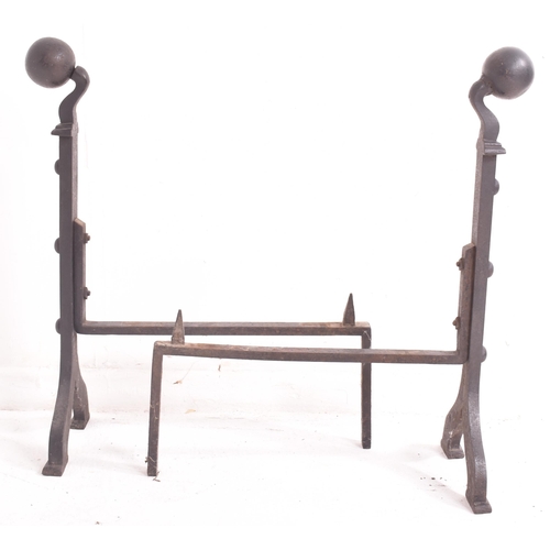 481 - A late 19th / early 20th century cast iron fire grate with andirons and Pot Jack. The fire set compr... 