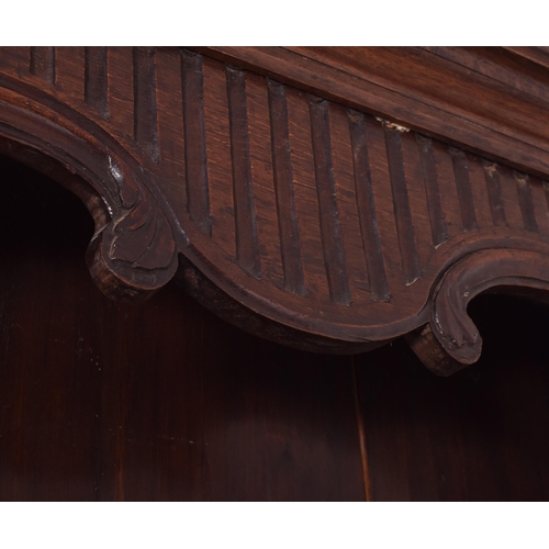 485 - A 19th century French provincial carved oak dresser. The dresser having a slender upright rack with ... 