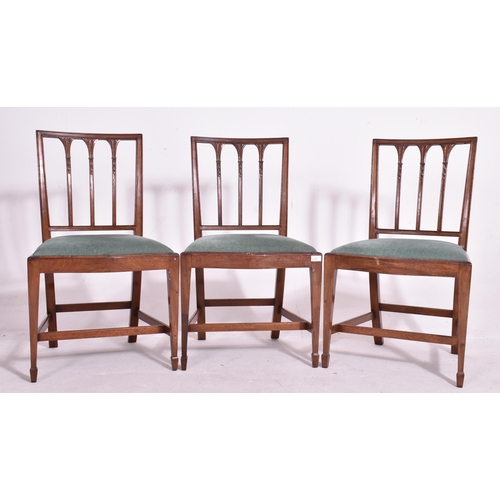 487 - A set of five George III early 19th century mahogany dining chairs in the manner of Hepplewhite. Eac... 