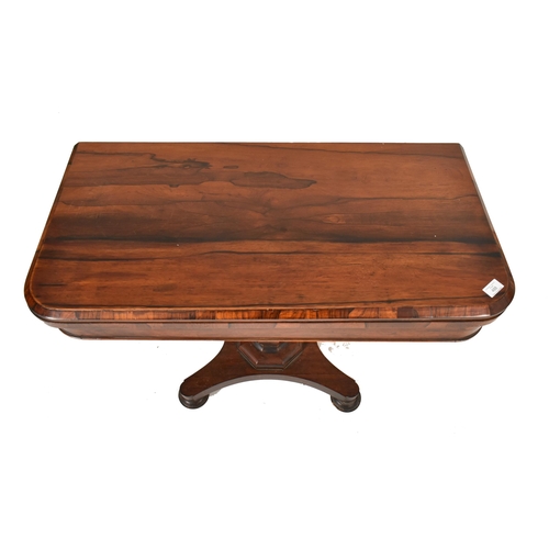 488 - A William IV 19th century rosewood card / games table. The table folding open to reveal central circ... 