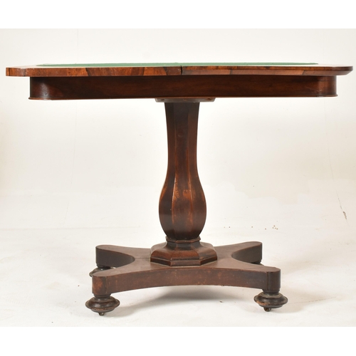 488 - A William IV 19th century rosewood card / games table. The table folding open to reveal central circ... 