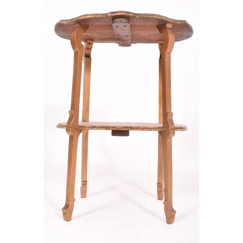 494 - A 19th century birdseye maple veneer stencil decorated two tiered etagere / whatnot. The side table ... 