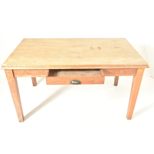 506 - An early 20th century circa 1920s oak refectory farmhouse dining table. The table having a rectangul... 