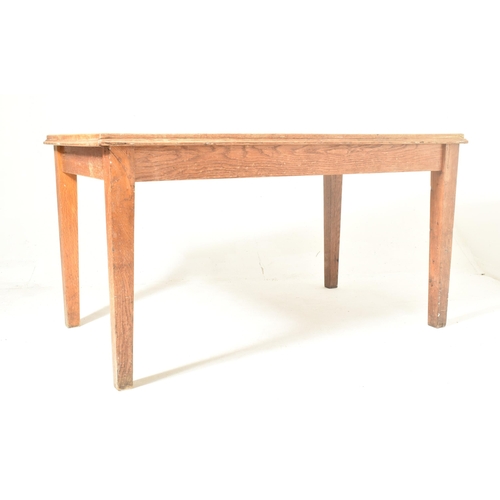 506 - An early 20th century circa 1920s oak refectory farmhouse dining table. The table having a rectangul... 