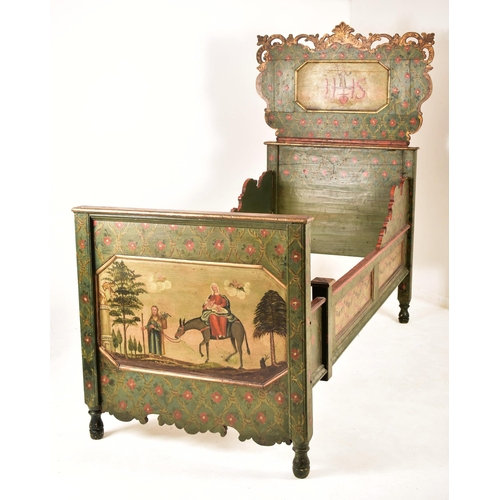 515 - An Austrian continental 19th century hand painted wood folk rustic single bed. The bed having a pier... 