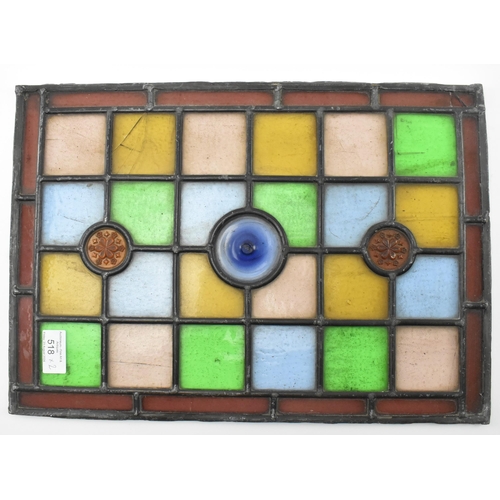 518 - A pair of late 19th century Victorian stained glass window panels. Each of the windows featuring geo... 