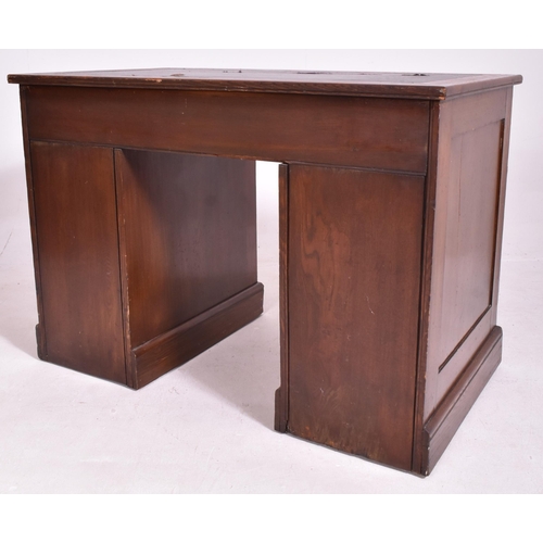 527 - An Edwardian early 20th century oak & leather top pedestal writing desk. The desk having a rectangul... 