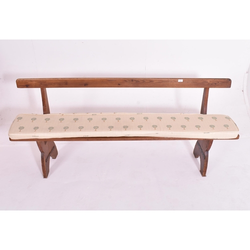 546 - A Victorian late 19th century pine church ecclesiastic / hall pew bench. The bench having a straight... 