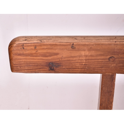 546 - A Victorian late 19th century pine church ecclesiastic / hall pew bench. The bench having a straight... 