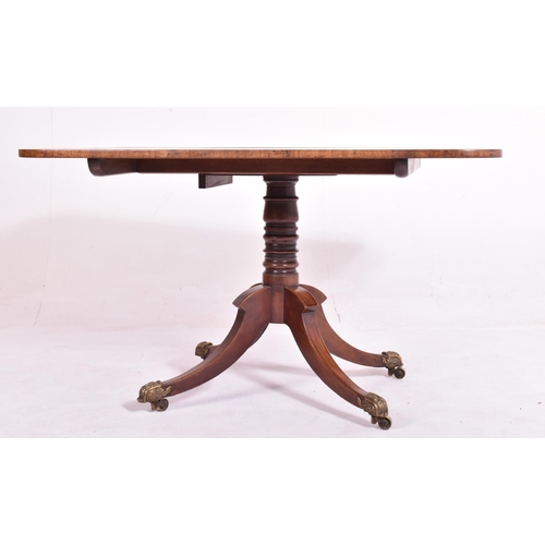 554 - A George III early 19th century mahogany tilt top breakfast table. The table having a rectangular to... 