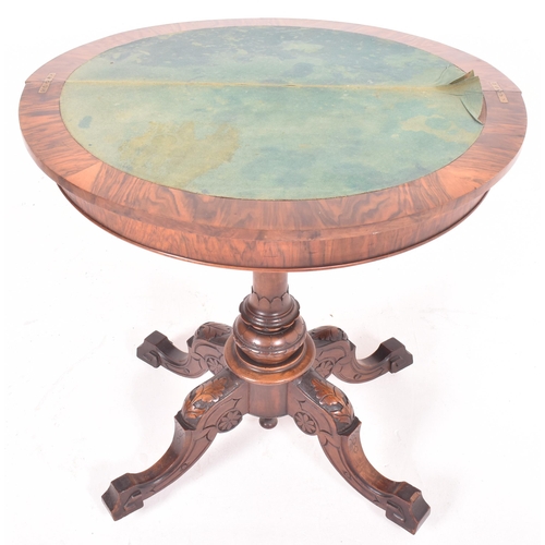 565 - A Victorian 19th century burr walnut demi-lune foldover card game table. The table having a chamfere... 