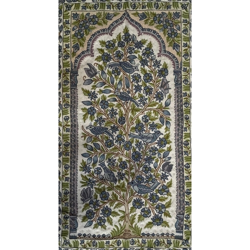 568 - A 20th century Turkish Islamic prayer floor carpet rug. The rug having a central panel with shaped m... 