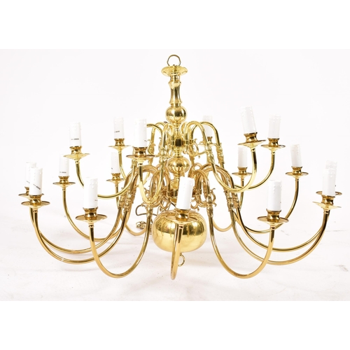 574 - A large 21st century brassed chrome metal and acrylic two tier twelve arms chandelier ceiling light.... 