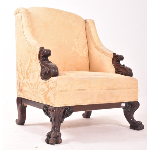 578 - A believed Irish / Scottish 19th century mahogany armchair. The chair having sloped armrests termina... 