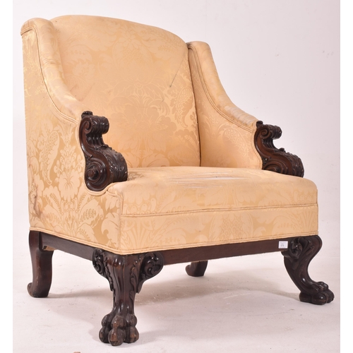 578 - A believed Irish / Scottish 19th century mahogany armchair. The chair having sloped armrests termina... 