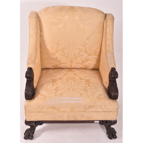 578 - A believed Irish / Scottish 19th century mahogany armchair. The chair having sloped armrests termina... 