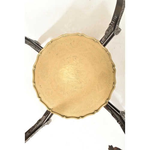 591 - A Republic period circular two tier brass tray-top folding table. The top of the tray in solid brass... 