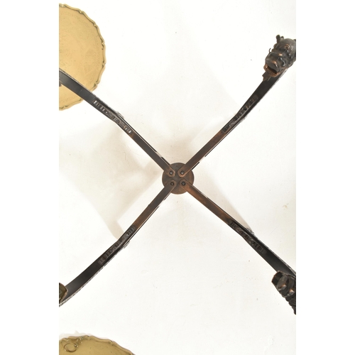 591 - A Republic period circular two tier brass tray-top folding table. The top of the tray in solid brass... 