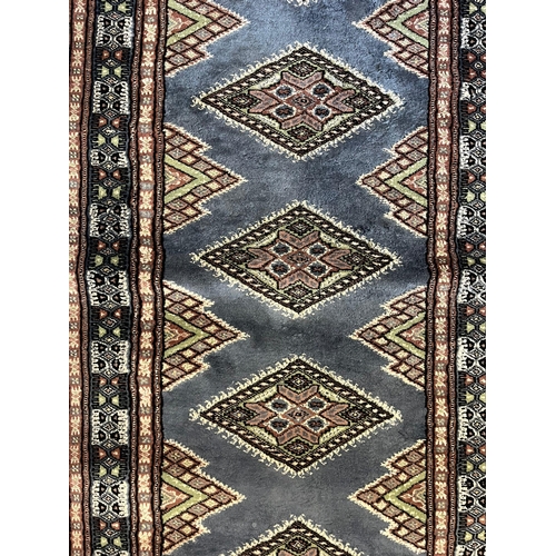 595 - A vintage late 20th century North West Persian Islamic hand knitted wool on silk floor runner rug. T... 