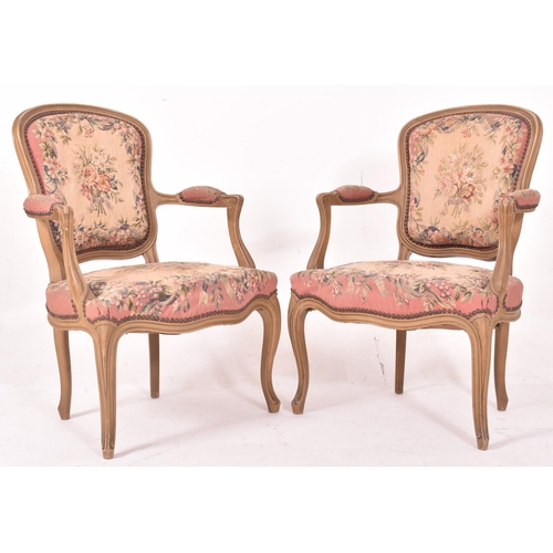 598 - A pair of French Louis XV style painted wood & aubusson upholstered fauteuil armchairs. Each chair h... 