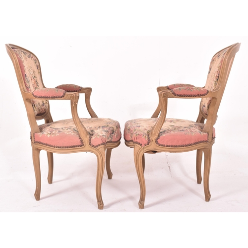 598 - A pair of French Louis XV style painted wood & aubusson upholstered fauteuil armchairs. Each chair h... 